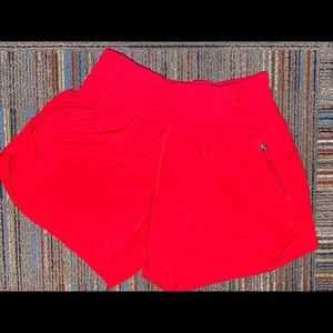 Red Lululemon running shorts